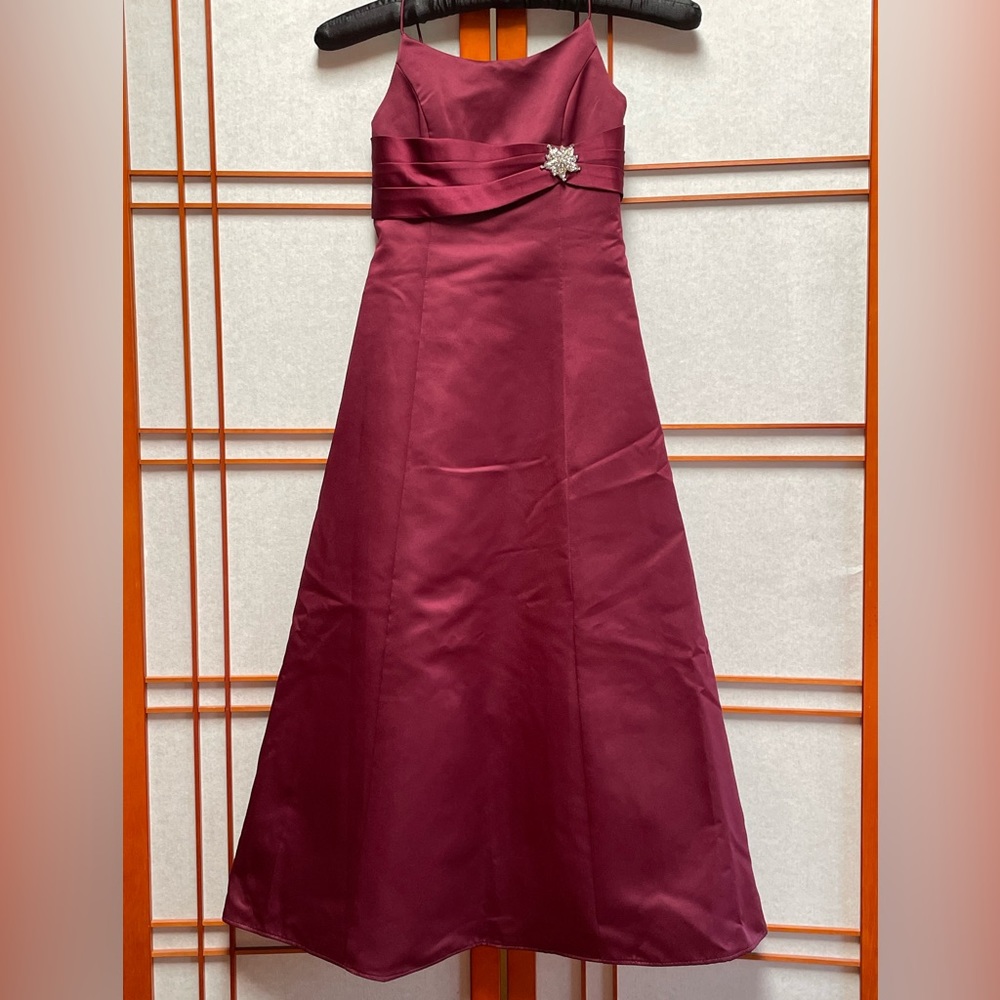 Burgundy formal dress by David’s Bridal